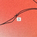 Close-up of the + mark at km 5 on the sample poster's route